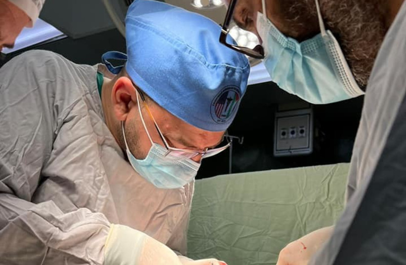 Members of PAMA’s surgical mission team operate on a patient, June 27, 2022, in the Gaza Strip. (credit: COURTESY/PALESTINIAN AMERICAN MEDICAL ASSOCIATION)