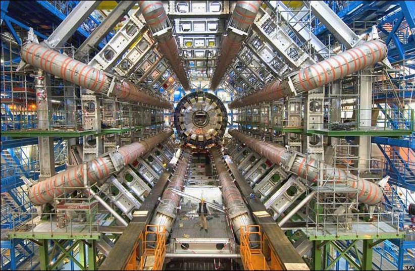  The ATLAS particle detector at CERN's Large Hadron Collider (LHC) in Switzerland (Illustrative). (credit: Image Editor/Flickr)
