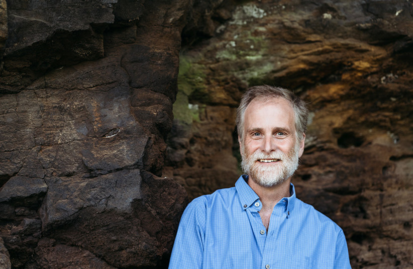 Darryl Granger of Purdue University developed the technology that updated the age of an Australopithecus found in Sterkfontein Cave. New data pushes its age back more than a million years, to 3.67 million years old.  (credit: Purdue University photo/Lena Kovalenko)