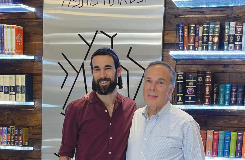  KOREN OWNER Matthew Miller with son Yehoshua, who heads the publisher’s Israeli and digital divisions. (credit: Courtesy Koren Publishers)