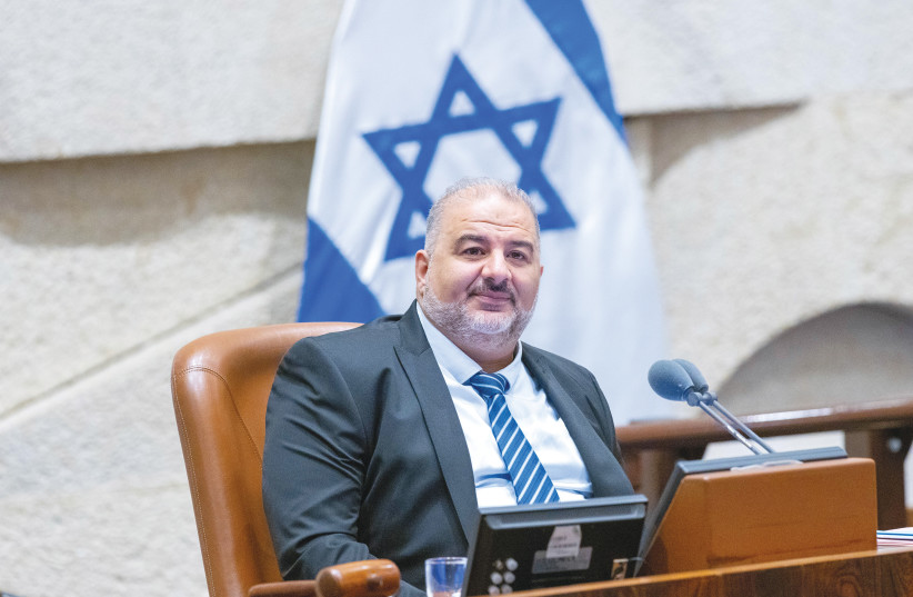  SITTING AS Knesset deputy speaker, MK Mansour Abbas presides over a debate in the plenum last week. (photo credit: OLIVIER FITOUSSI/FLASH90)
