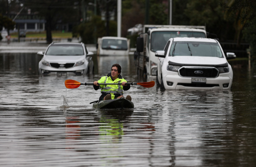  Flooding from heavy rains affects western suburbs in Sydney (photo credit: REUTERS)