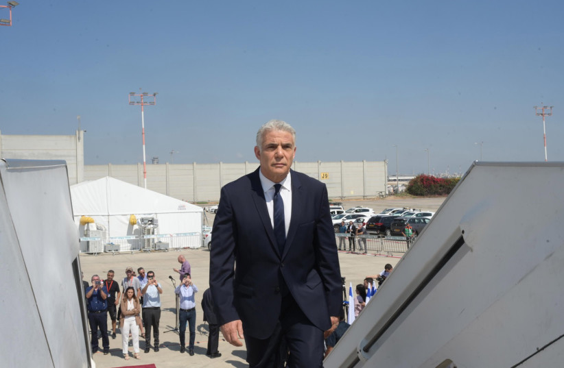  Prime Minister Yair Lapid on his first visit as PM, to France, July 5, 2022.  (credit: AMOS BEN GERSHOM/GPO)