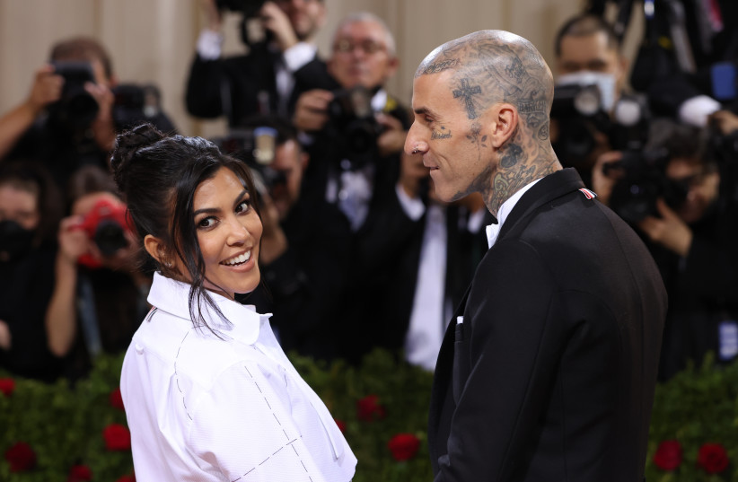  Travis Barker and Kourtney Kardashian arrive at the In America: An Anthology of Fashion themed Met Gala at the Metropolitan Museum of Art in New York City, New York, US, May 2, 2022. (photo credit: Andrew Kelly/Reuters)