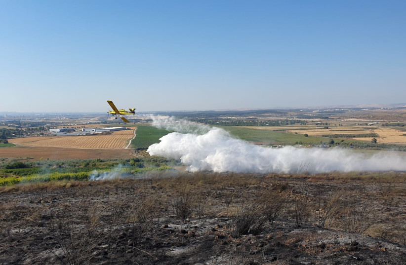  Hundreds of dunams of the Tel Gezer National Park were destroyed by a fire started by a pruning fire at a neighboring moshav. (credit: Israel Fire Department)