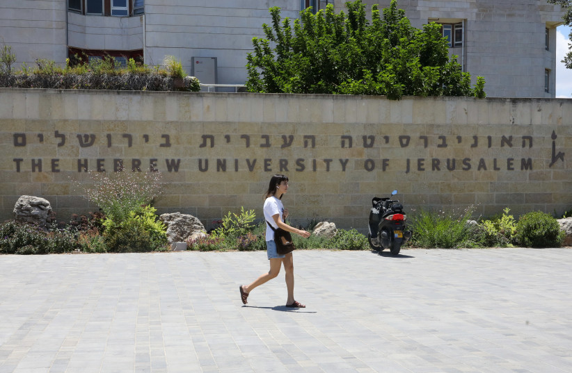  Israelis walking in front of the entrance to the Hebrew University of Jerusalem (credit: MARC ISRAEL SELLEM/THE JERUSALEM POST)