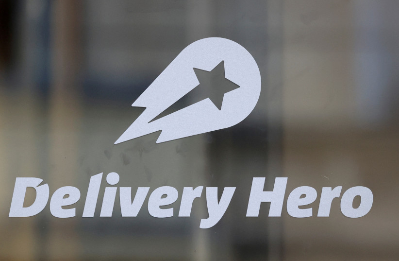  The Delivery Hero's logo is pictured at its headquarters in Berlin, Germany, August 18, 2020. (photo credit: REUTERS/FABRIZIO BENSCH)