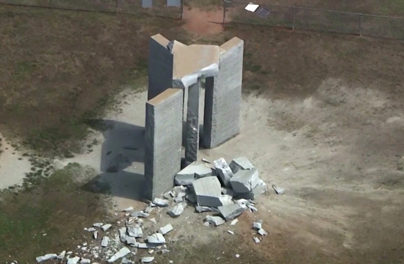  Rubble is cast around the Georgia Guidestones after an explosion in Elberton, Georgia, US, July 6, 2022 in a still image from video.  (photo credit: ABC Affiliate WSB-TV via REUTERS)