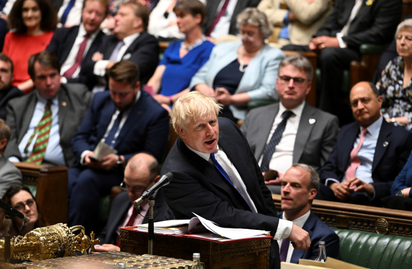  UK PM Boris Johnson insists that he is not resigning despite resignations from dozens of ministers in PMQ's on Wednesday, July 6. (photo credit: UK PARLIAMENT/JESSICA TAYLOR/HANDOUT VIA REUTERS)