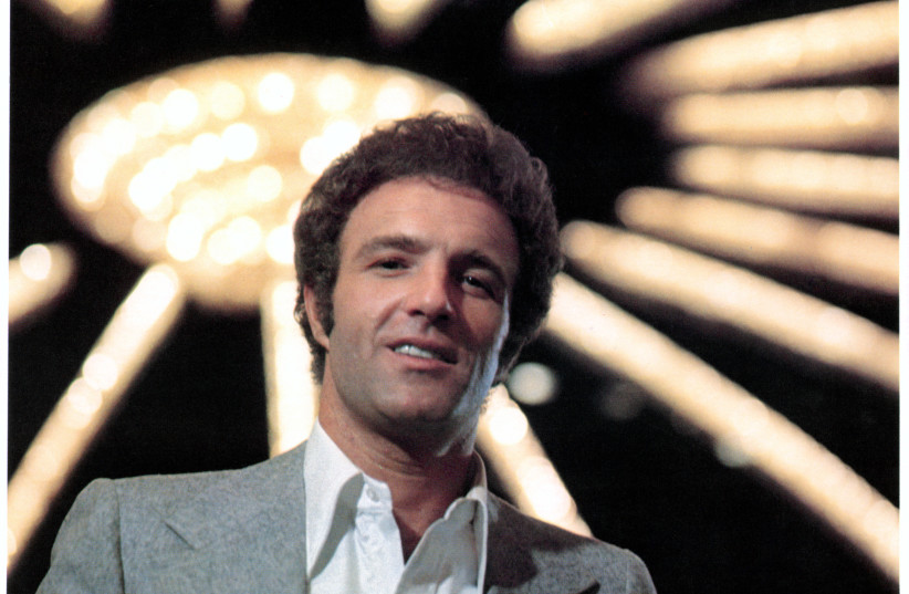 James Caan stands under casino lights in a scene from the 1974 film "The Gambler." (photo credit: Paramount/Getty Images)
