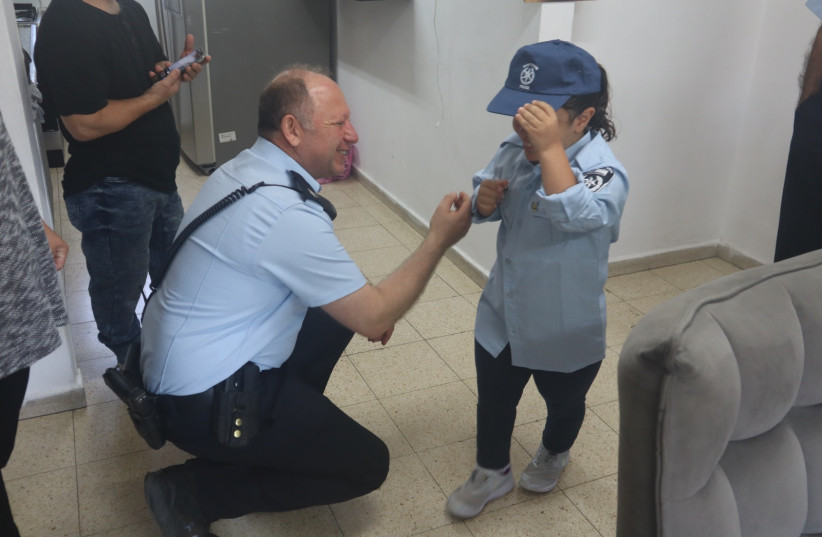  Nine-year-old Oriyah gets to meet police officers and work as an officer for a day. (photo credit: ISRAEL POLICE SPOKESPERSON'S UNIT)
