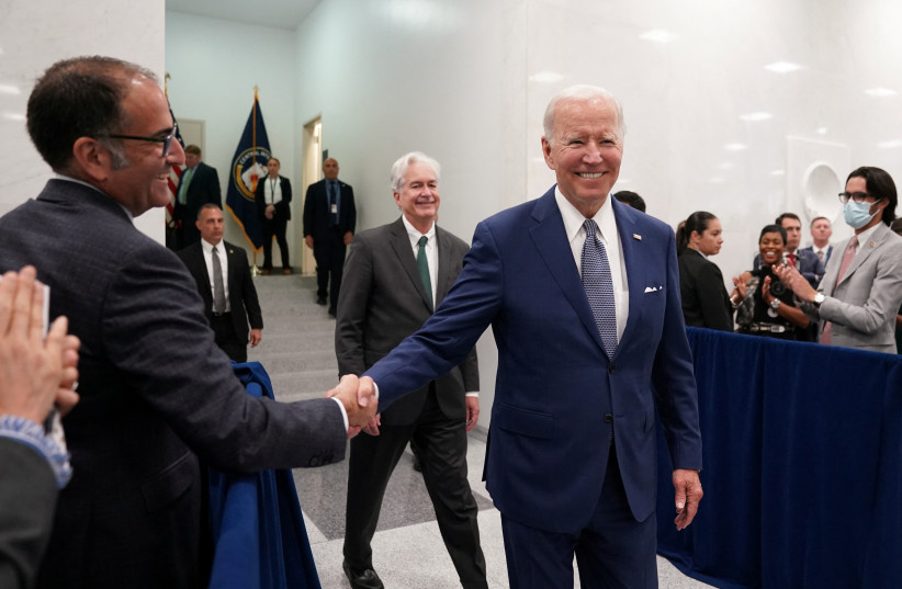  US President Joe Biden is welcomed by Central Intelligence Agency employees during his visit to CIA Headquarters in Langley, Virginia, US, July 8, 2022 (photo credit: REUTERS/KEVIN LAMARQUE)