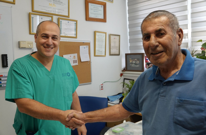  Dr. Danny Dvir on left with heart patient Natan Cohen. (credit: COURTESY OF SZMC)