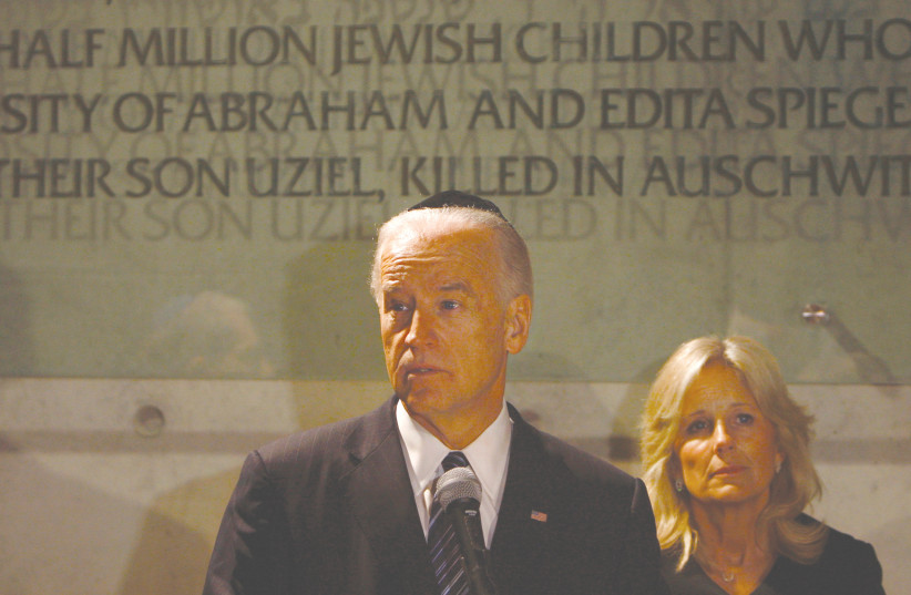  US PRESIDENT Joe Biden, then serving as vice president, is joined by his wife, Jill, on a visit to Yad Vashem, in 2010. On his presidential trip to Israel, Biden is scheduled to visit Yad Vashem again. (photo credit: RONEN ZVULUN/REUTERS)