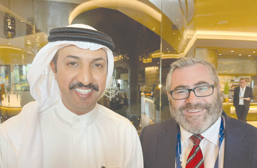  THE WRITER poses with Shaikh Abdulla bin Ahmed bin Abdulla Al Khalifa, Bahrain’s undersecretary for international affairs in the Foreign Ministry, during a recent visit by a delegation of American Jewish professionals. (photo credit: AISH)