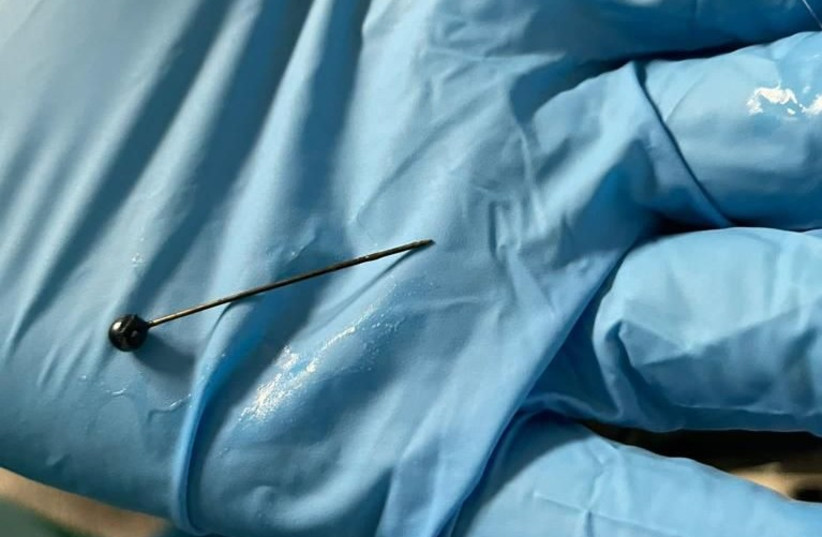  An image of a hairpin that was removed from the stomach of a 15-year-old girl. (photo credit: SHAARE ZEDEK MEDICAL CENTER)