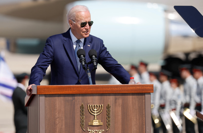 US President Joe Biden delivers remarks during an arrival ceremony at the Ben Gurion International Airport in Lod, near Tel Aviv, Israel, July 13, 2022 (photo credit: REUTERS/AMIR COHEN)
