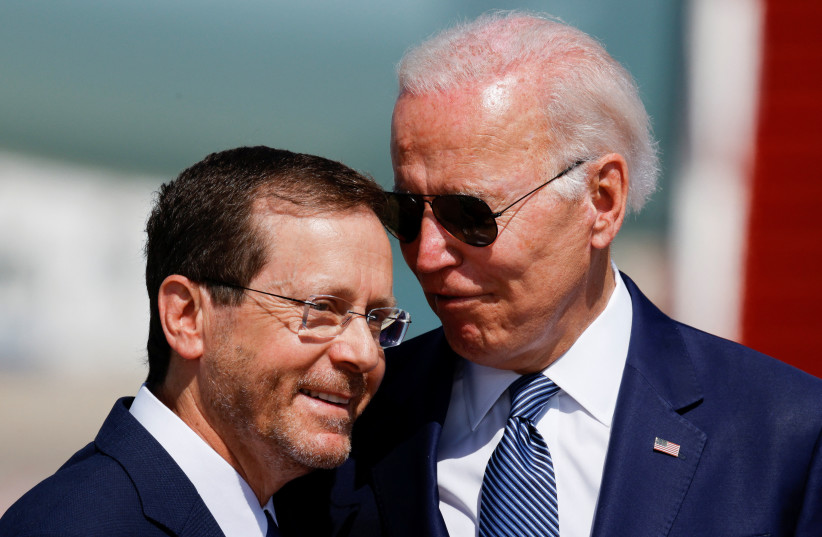  President Isaac Herzog and US President Joe Biden participate in a welcoming ceremony at Ben Gurion International Airport in Lod, near Tel Aviv, Israel, July 13, 2022 (credit: REUTERS/AMIR COHEN)