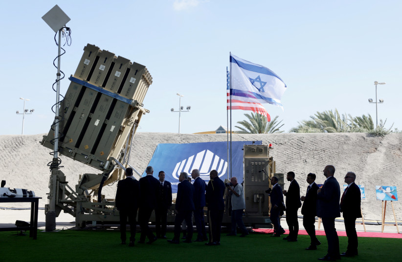  Prime Minister Yair Lapid, Defense Minister Benny Gantz and US President Joe Biden attend a briefing on the Israel's Iron Dome and Iron Beam Air Defense Systems at the Ben Gurion International Airport in Lod, near Tel Aviv, Israel, July 13, 2022 (credit: REUTERS/EVELYN HOCKSTEIN)
