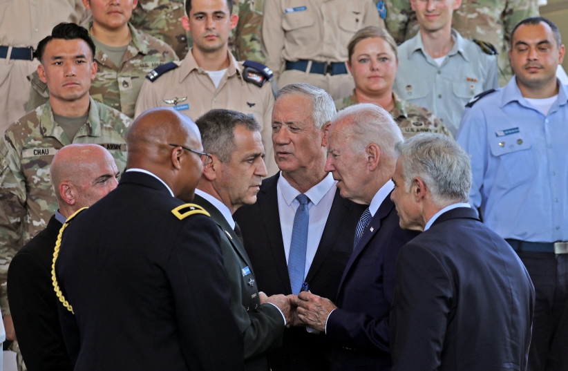  US President Joe Biden speaks to IDF Chief of Staff Aviv Kohavi as Israeli Defence Minister Benny Gantz, caretaker Prime Minister Yair Lapid, and US Defence Attache in Israel, Brigadier General Shawn A. Harris look on, during a tour of Israel's defense system at Ben Gurion Airport (credit: GIL COHEN-MAGEN/AFP VIA GETTY IMAGES)