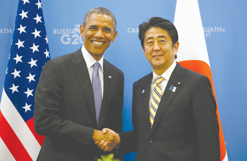 THEN-US president Barack Obama meets with then-Japanese prime minister Shinzo Abe at the G20 Summit in St. Petersburg, Russia, 2013. (photo credit: KEVIN LAMARQUE/REUTERS)