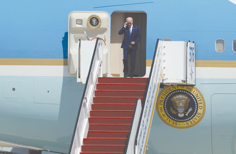  President Joe Biden descends from Air Force One at Ben-Gurion International Airport on Wednesday. (credit: AMMAR AWAD/REUTERS)