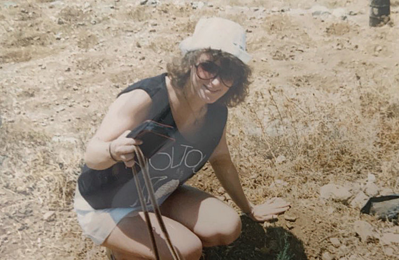  THE WRITER plants a tree during her Israel tour, 36 years ago.  (photo credit: ANDREA SAMUELS)