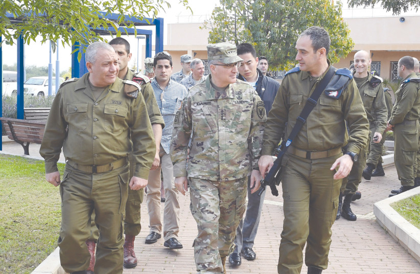  THEN-COMMANDER of the US European Command General Curtis M. Scaparrotti tours the Arrow Missile Defense System headquarters in Palmahim, accompanied by then-IDF chief of staff Lt. Gen. Gadi Eizenkot and then-Air Defense commander Brig. Gen. Zvika Haimovitch (right), in 2017.  (photo credit: Matty Stern/US Embassy of Tel Aviv)
