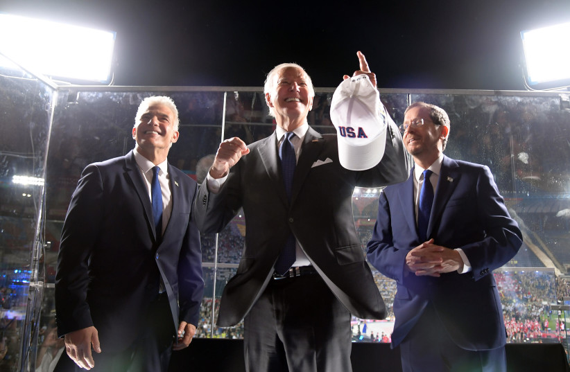  US President Joe Biden with Prime Minister Yair Lapid and President Isaac Herzog at the opening of the 21st Maccabiah Games, July 14, 2022 (credit: HAIM ZACH/GPO)