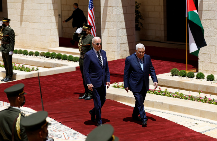  Palestinian President Mahmoud Abbas welcomes US President Joe Biden in Bethlehem in the Israeli-occupied West Bank July 15, 2022. (credit: REUTERS/MOHAMAD TOROKMAN)