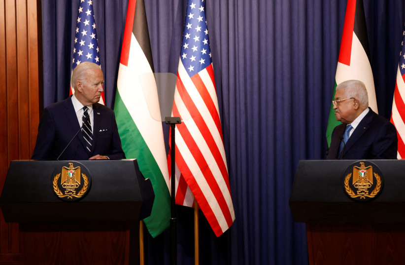  Palestinian President Mahmoud Abbas and US President Joe Biden give a statement, in Bethlehem in the West Bank July 15, 2022. (photo credit: REUTERS/MOHAMAD TOROKMAN)