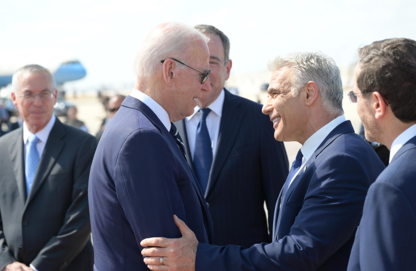  US President Joe Biden with Prime Minister Yair Lapid ahead of Biden's departure from Israel for Saudi Arabia, July 15, 2022 (photo credit: AMOS BEN-GERSHOM/GPO)