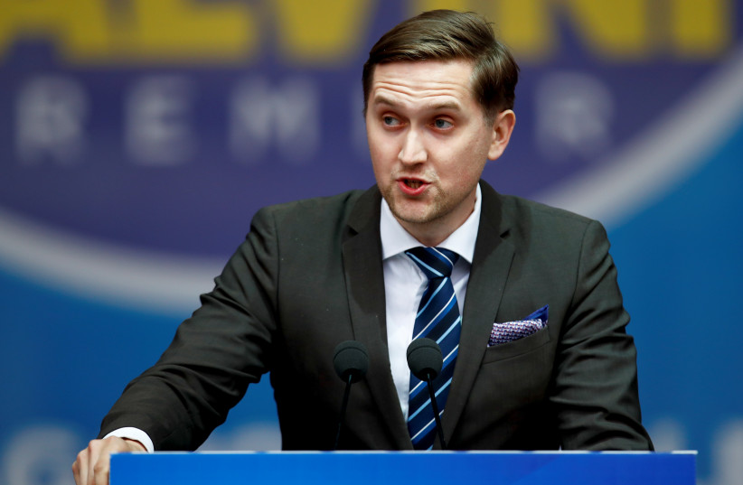  Jaak Madison, member of Estonian party EKRE (Conservative People's Party of Estonia) addresses a major rally of European nationalist and far-right parties ahead of EU parliamentary elections in Milan, Italy May 18, 2019 (photo credit: REUTERS/ALESSANDRO GAROFALO)