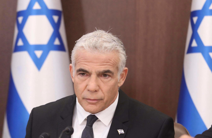  Prime Minister Yair Lapid at Sunday's cabinet meeting, July 17, 2022.  (photo credit: MARC ISRAEL SELLEM/THE JERUSALEM POST)