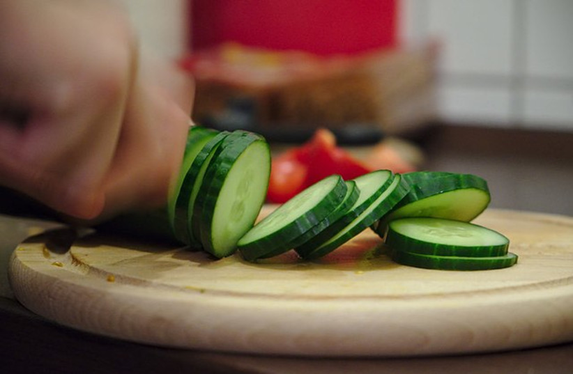  Cutting cucumbers. (photo credit: Wikimedia Commons)