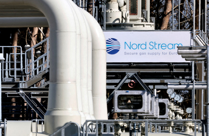 Pipes at the landfall facilities of the 'Nord Stream 1' gas pipeline are pictured in Lubmin, Germany, March 8, 2022. (photo credit: REUTERS/HANNIBAL HANSCHKE/FILE PHOTO)