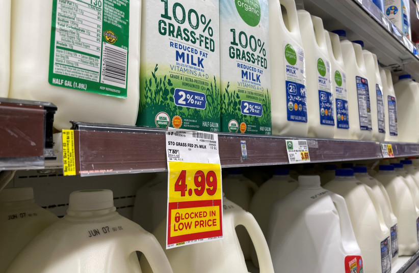  Milk is seen in a supermarket, as inflation continues to hit consumers with the annual CPI increasing 8.3% in the 12 months through April, in Los Angeles, California, U.S. May 27, 2022. (photo credit: REUTERS/LUCY NICHOLSON)