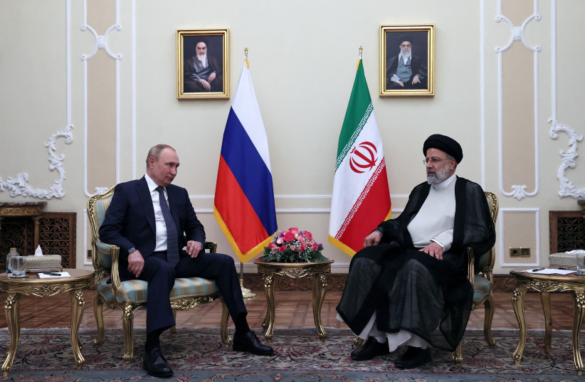 Russian President Vladimir Putin and Iranian President Ebrahim Raisi attend a meeting in Tehran, Iran July 19, 2022. (credit: Sputnik/Sergei Savostyanov/Pool via REUTERS)