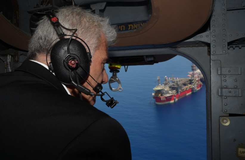  Prime Minister Yair Lapid flies over the Karish gas rig, July 19, 2022 (credit: AMOS BEN-GERSHOM/GPO)