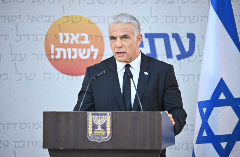 Prime Minister Yair Lapid giving his first speech as Yesh Atid chairman since taking over as PM , July 20, 2022. (photo credit: ELAD GUTMAN)