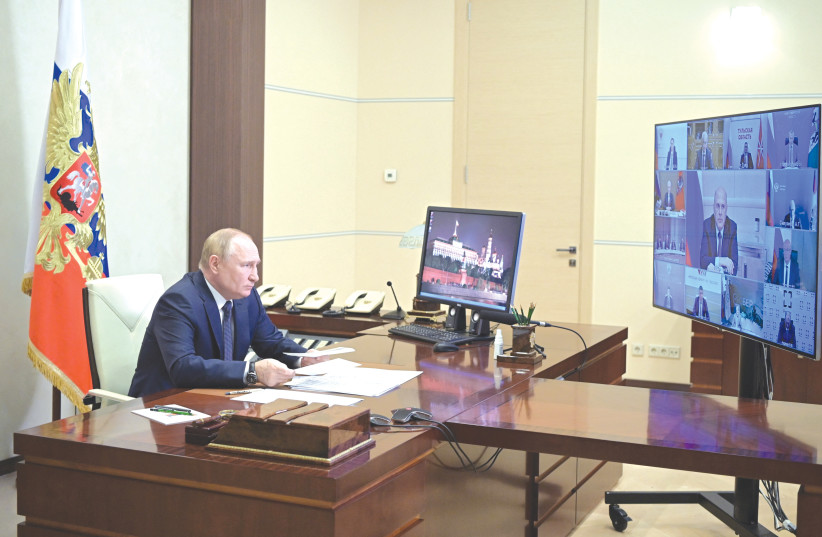  RUSSIAN PRESIDENT Vladimir Putin chairs a meeting of the Council for Strategic Development and National Projects via a video conference call at a residence outside Moscow, on Monday.  (photo credit: Sputnik/Kremlin/Reuters)