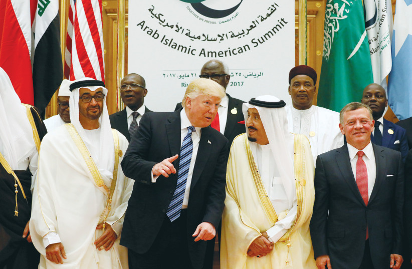  THEN-US president Donald Trump poses with other leaders at the Arab-Islamic-American Summit in Riyadh, in 2017. (photo credit: JONATHAN ERNST/REUTERS)