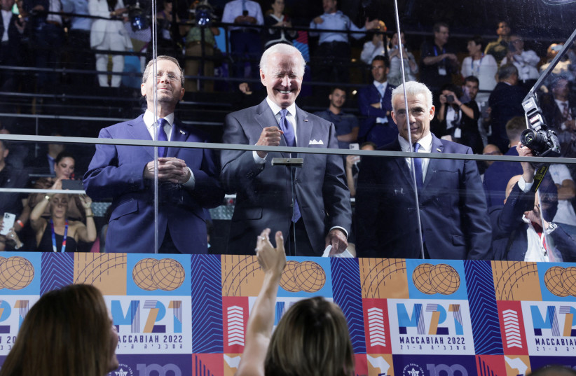  U.S. President Joe Biden, Israeli President Isaac Herzog and Israeli Prime Minister Yair Lapid visit Teddy Stadium, in Jerusalem, July 14, 2022. (photo credit: REUTERS/EVELYN HOCKSTEIN)