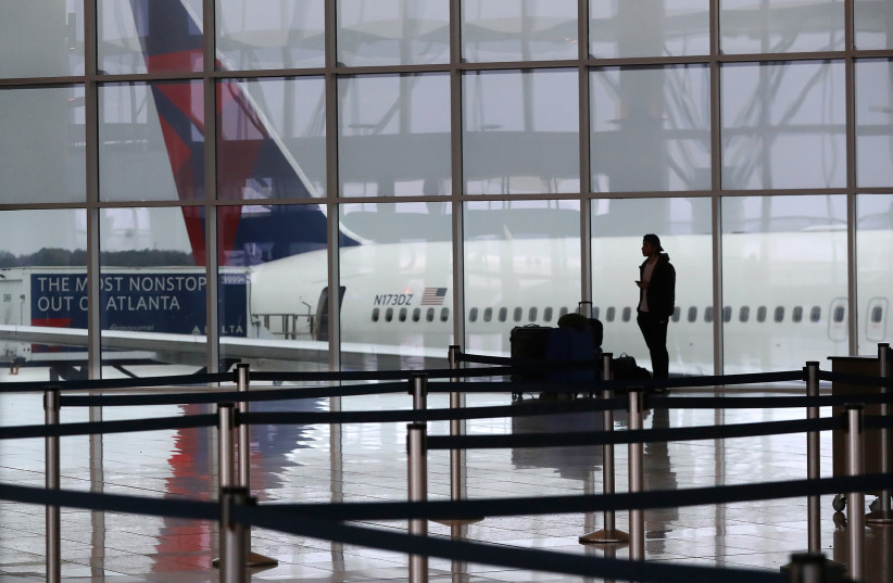  A Delta plane sits at the International Terminal at Atlanta's Hartsfield-Jackson International Airport in March 2020. (credit: CURTIS COMPTON/ATLANTA JOURNAL-CONSTITUTION/TNS)