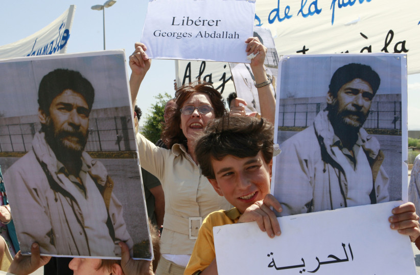  Relatives of Georges Ibrahim Abdallah protest on airport road calling on France's President Nicolas Sarkozy to release him, upon Sarkozy's arrival in Beirut June 7, 2008.  (photo credit: REUTERS/JAMAL SAIDI)
