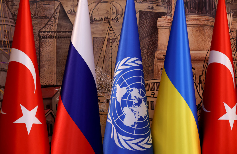 Flags of Turkey, Russia, the United Nations and Ukraine are seen on the day of a signing ceremony in Istanbul, Turkey July 22, 2022 (credit: REUTERS/UMIT BEKTAS)