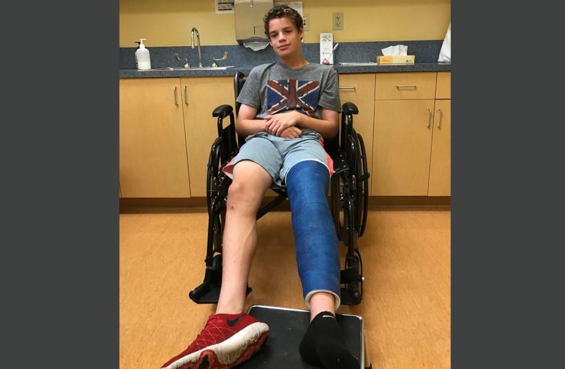 Adam Henry fractured his left growth plate weeks before the 2017 Maccabiah Games. (credit: JACK WIENER/VIA JTA)