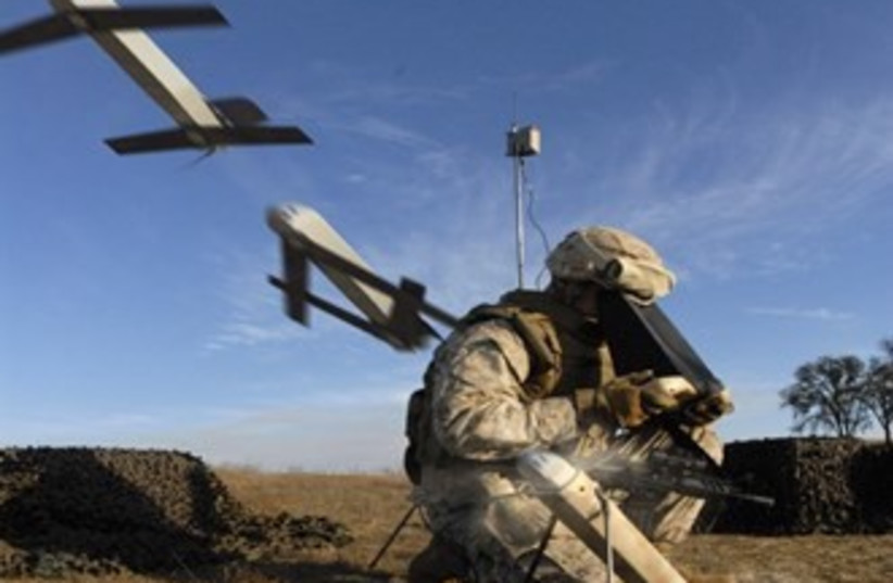 AeroVironment Switchblade 300s being launched (photo credit: US ARMY AMRDEC PUBLIC AFFAIRS/PUBLIC DOMAIN/VIA WIKIMEDIA COMMONS)