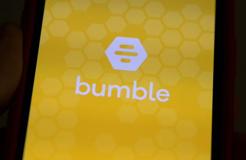  The Bumble Inc. (BMBL) app is shown on an Apple iPhone in this photo illustration as the dating app operator made its debut IPO on the Nasdaq stock exchange February 11, 2021 (credit: REUTERS/MIKE BLAKE/ILLUSTRATION)