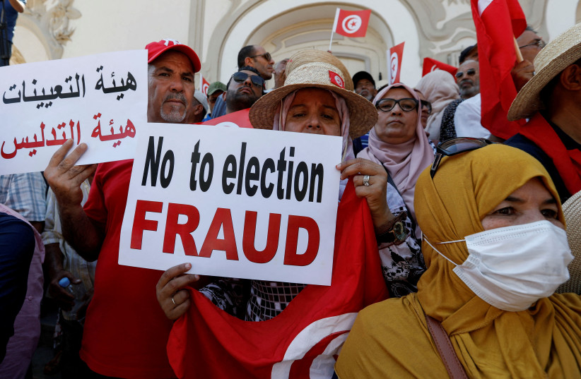  People take part in a protest against President Kais Saied's referendum on a new constitution, in Tunis, Tunisia, July 23, 2022. (credit: REUTERS/ZOUBEIR SOUISSI)